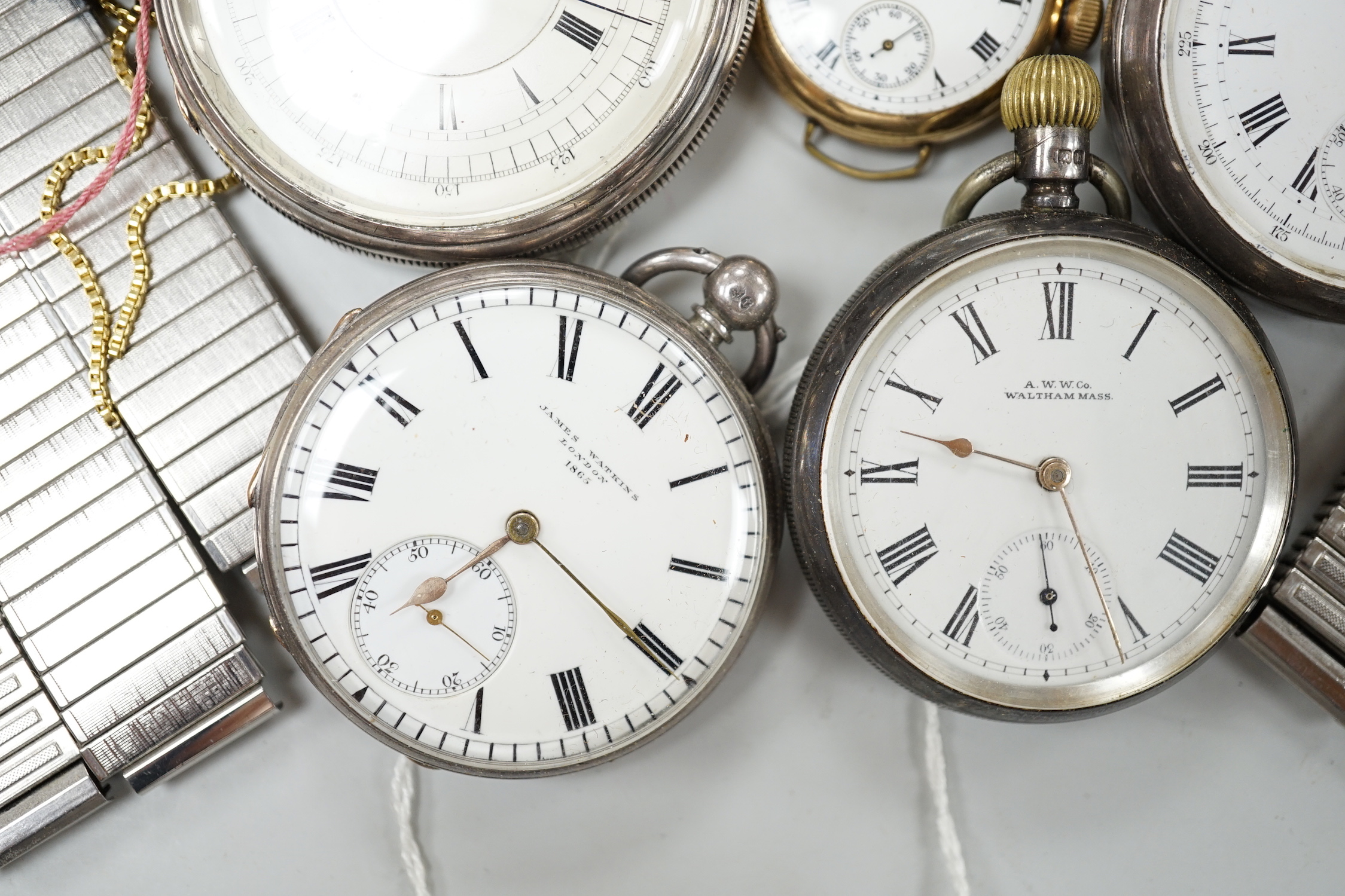 Twenty one assorted silver or base metal pocket watches including Waltham and Child of Birmingham, three wrist watches and a silver vesta case.